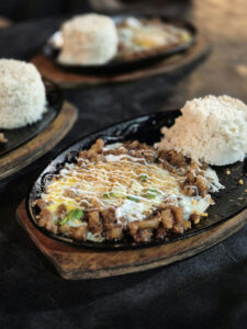 Pampanga food trip – sizzling sisig on a hot plate