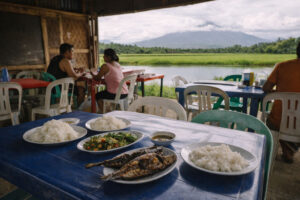 Simple lakeside eatery with grilled fish and fields for Camarines Sur travel guide