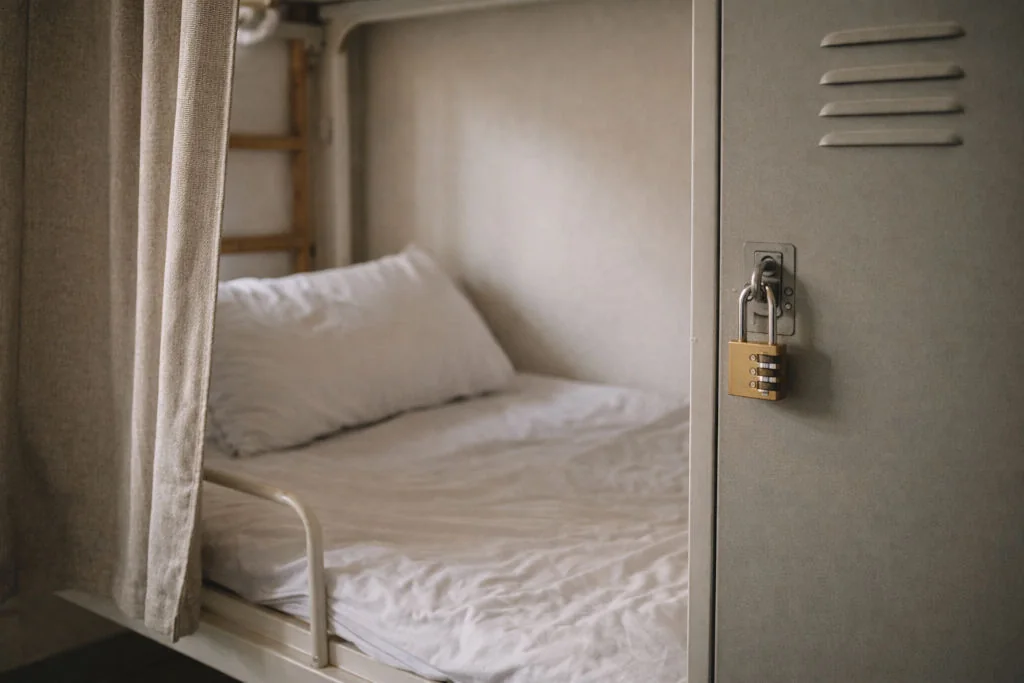 Philippines hostel guide showing dorm privacy curtains and secure lockers