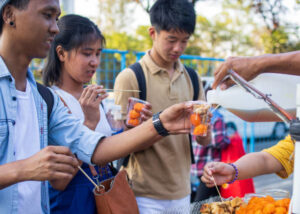 Students sharing merienda in a small town reflecting cultural immersion Philippines