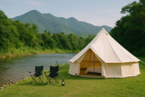 Riverside bell tent glamping setup in Rizal with mountain views
