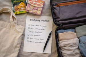 bakasyon planning with a pasalubong list and smart luggage space setup
