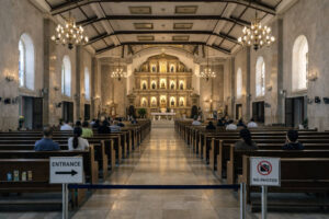 Basilica Minore del Santo Niño interior seating area with quiet worship mood