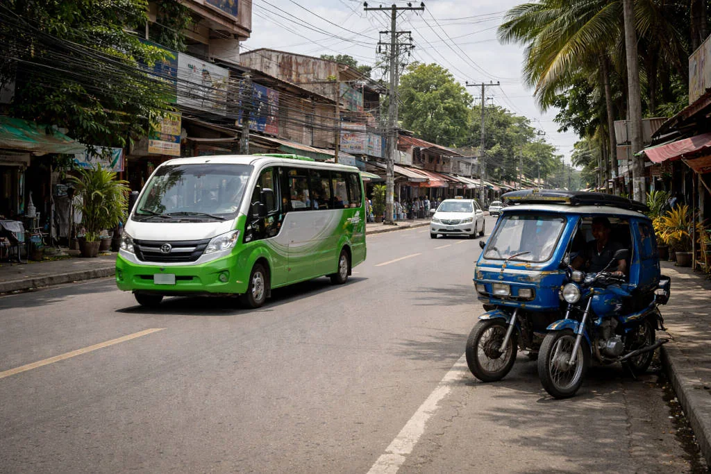 Street scene showing how to get around iloilo city with common local transport options