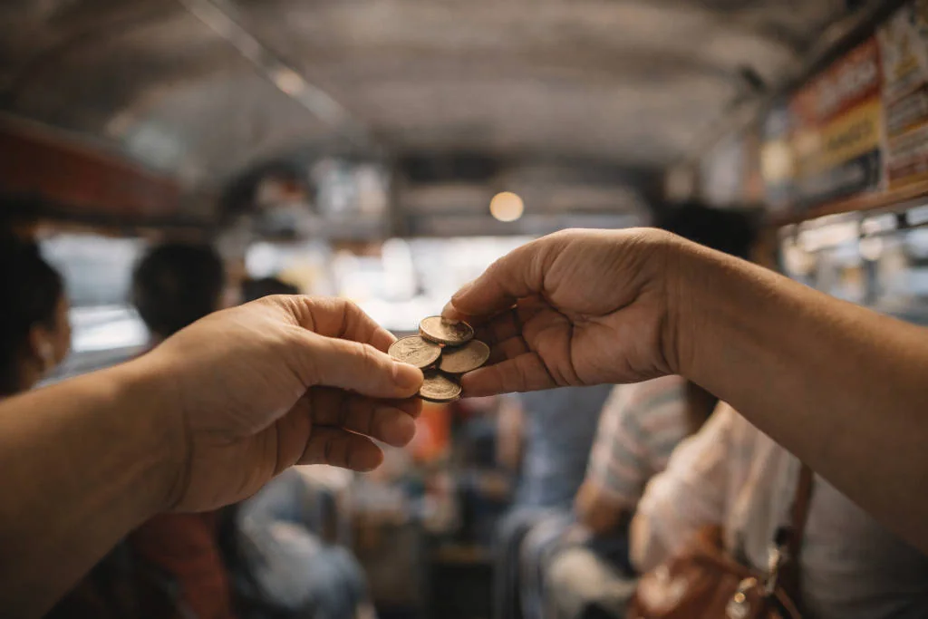 jeepney and tricycle guide showing the bayad po chain passing fare forward inside a jeepney