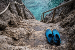 Limestone steps to Barracuda Lake showing why aqua shoes help