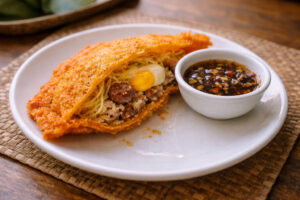 Ilocos Empanada With Sukang Iloko On The Side At The best restaurants in Ilocos Norte