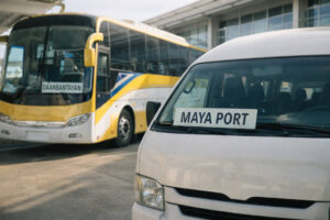 Aircon bus or shared van route sign showing Maya Port for Manila to Malapascua transfer