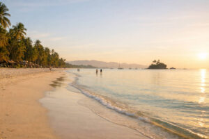 Early morning White Beach scene for a Boracay travel guide with calm water and open space to walk