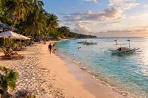 White Beach view for a Moalboal Travel Guide with a wider sandy shore and quieter resort feel