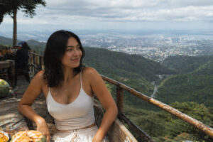 Mika Santos smiling during an easy Busay stop on day trips from Cebu City