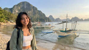Early morning El Nido weekend trip shoreline with boats and limestone cliffs