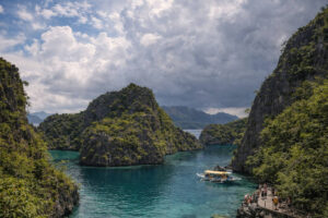 Best time to visit Kayangan Lake shown through changing weather over Coron limestone cliffs