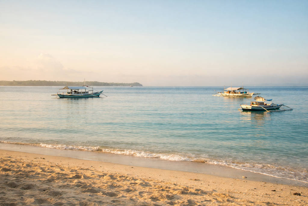 Mactan Itinerary 3 Days: Realistic Pace With Buffers Calm morning shoreline in Mactan for a Mactan itinerary 3 days