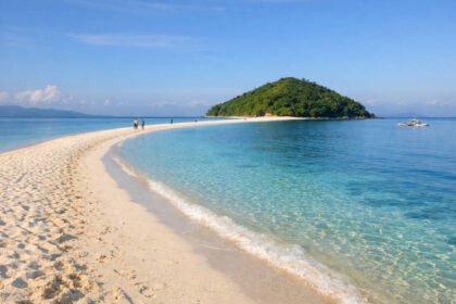 Romblon Travel Guide: Where To Stay, What To Do, And Low-Stress Planning Romblon Travel Guide view of Bonbon Beach on a calm bright morning