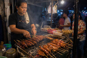 Cebu street barbecue skewers over charcoal