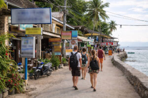 Panagsama area in Moalboal with dive shops and walkable food spots near the shore