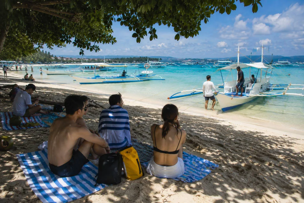 Beach stop on a Boracay island hopping itinerary
