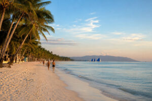 Boracay vs Siargao guide showing calm morning beach atmosphere in Boracay