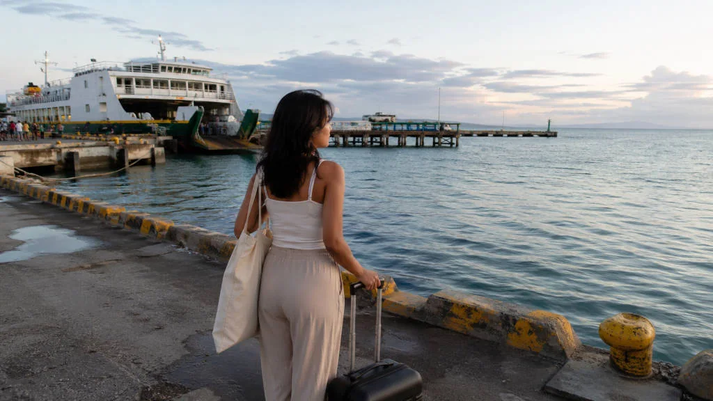 Traveler planning the Cebu City to Siquijor ferry route at the port