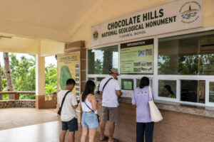 Chocolate Hills entrance fee area where visitors confirm current fees