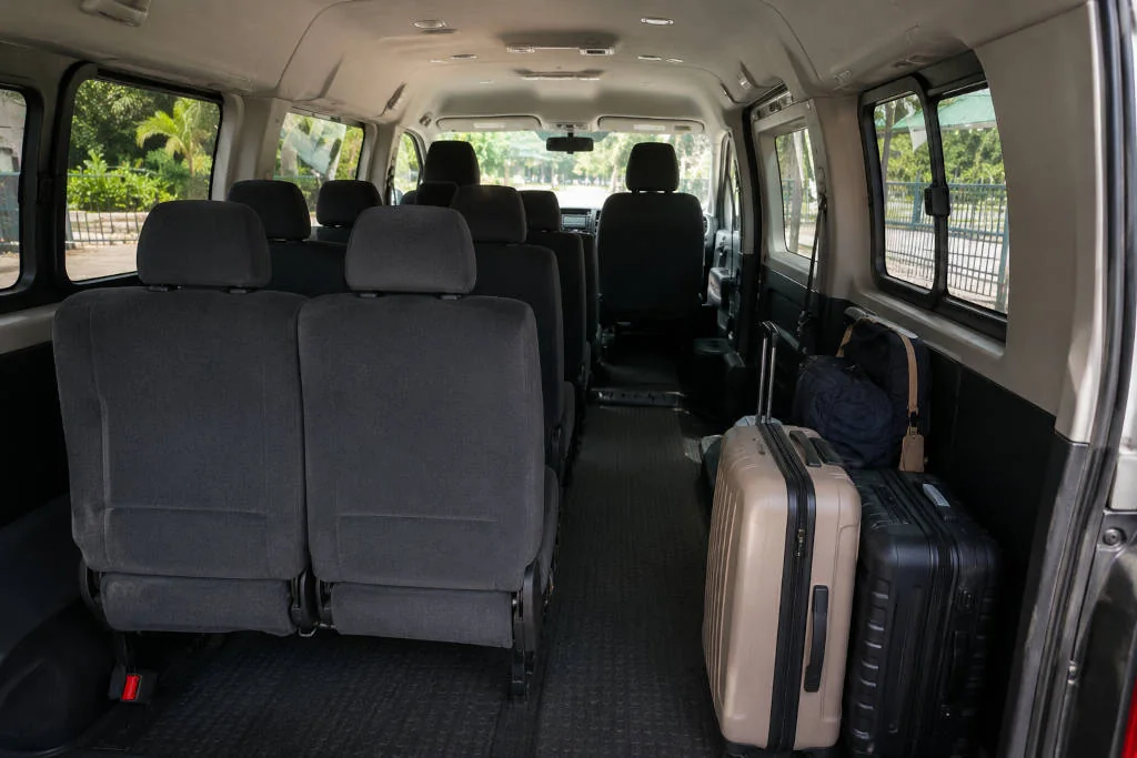 Seating and luggage space for a Coron Airport to Town van transfer