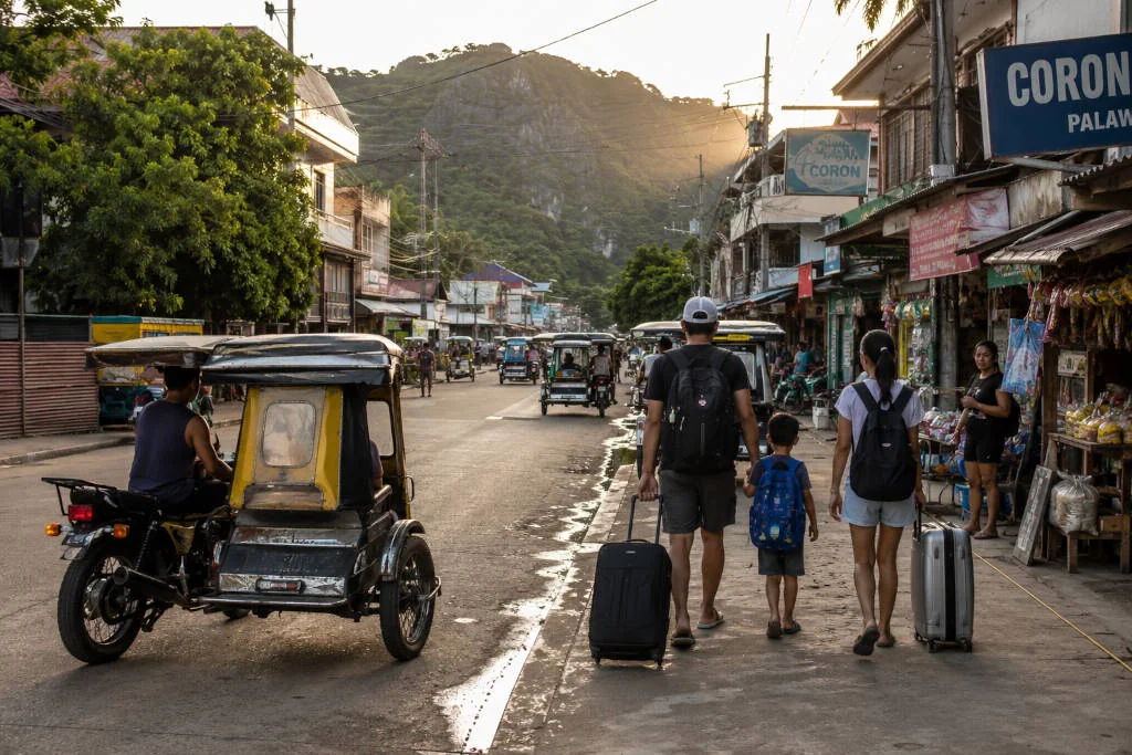 Coron with Kids town street scene for families planning local transport.