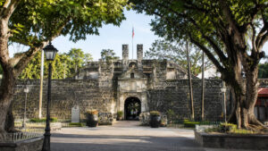 Fort San Pedro entrance Cebu City with stone walls and trees