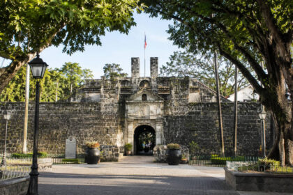 Fort San Pedro entrance Cebu City with stone walls and trees