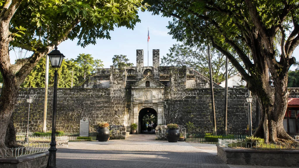 Fort San Pedro entrance Cebu City with stone walls and trees