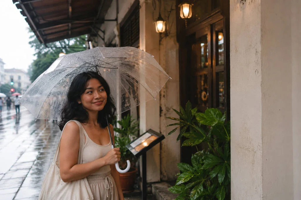 Mika with an umbrella during Iloilo City rainy season travel