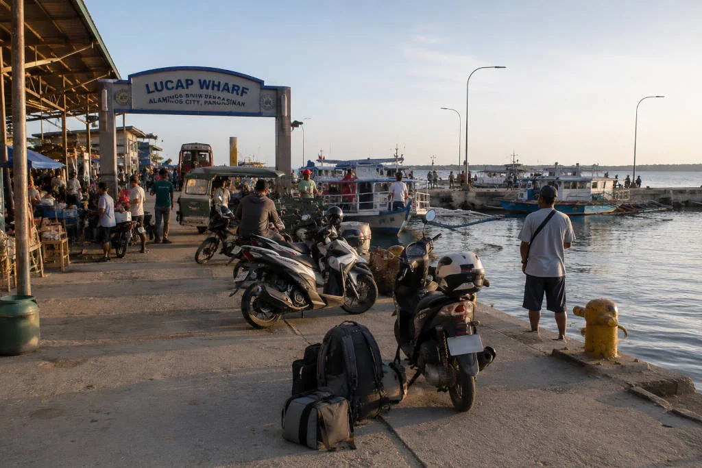Lucap Wharf arrival on the Manila to Hundred Islands motorcycle route