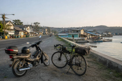 Small motorcycle planning the Manila to Hundred Islands motorcycle route near Lucap