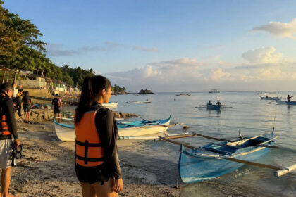 Early morning boats near Cebu for the oslob whale shark watching entrance fee guide