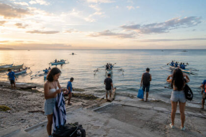 Early morning boats for Oslob whale shark watching in Tan-awan Cebu