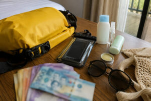 Cash and small bills prepared for a twin lagoon entrance fee and boat tour