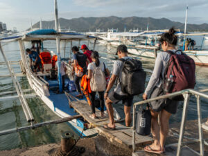 Travelers preparing for Coron island hopping with possible twin lagoon entrance fee costs