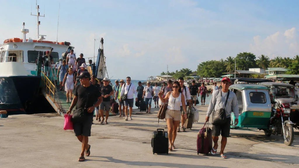 Travelers arriving at Santa Fe Port for a Bantayan Island travel budget trip