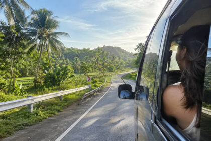 How To Get Around Bohol Countryside: Tricycles, Vans, Cars, And Local Transport Private vehicle on a quiet road showing how to get around Bohol countryside comfortably