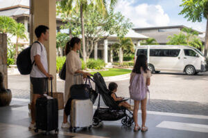 Family with luggage choosing transport from a Mactan hotel