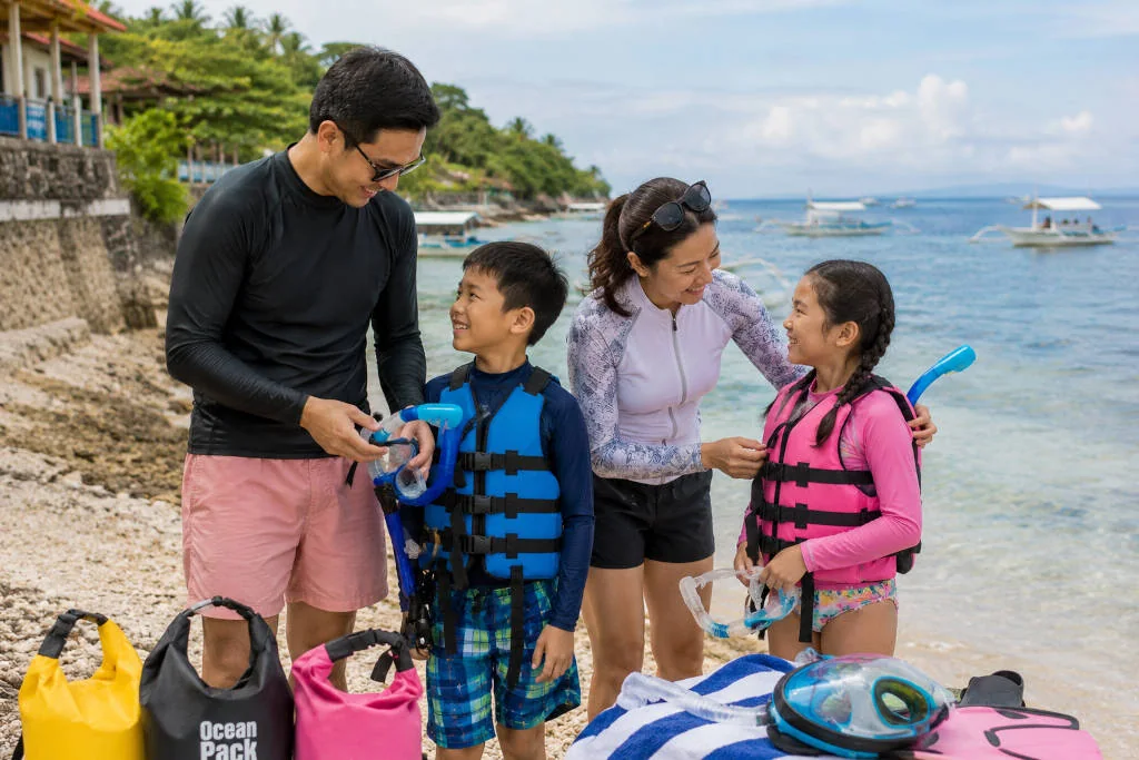 Moalboal shoreline for family-friendly activities cebu with slower beach and snorkeling pace