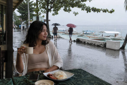 Moalboal Rainy Day Ideas: Indoor Stops, Food Breaks, and Flexible Plans Moalboal rainy day near Panagsama Beach with travelers taking a slow food break