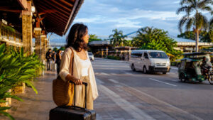 Mika waiting at Puerto Princesa Airport to city center transport at the arrival curb